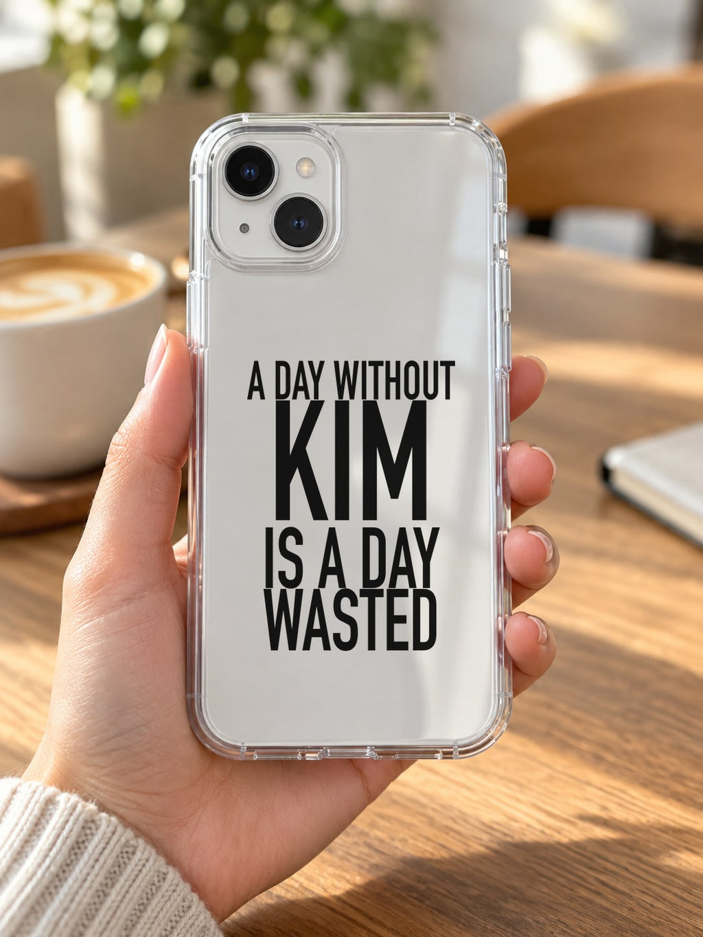 A DAY WITHOUT KIM IS A DAY WASTED phone-case handheld mockup