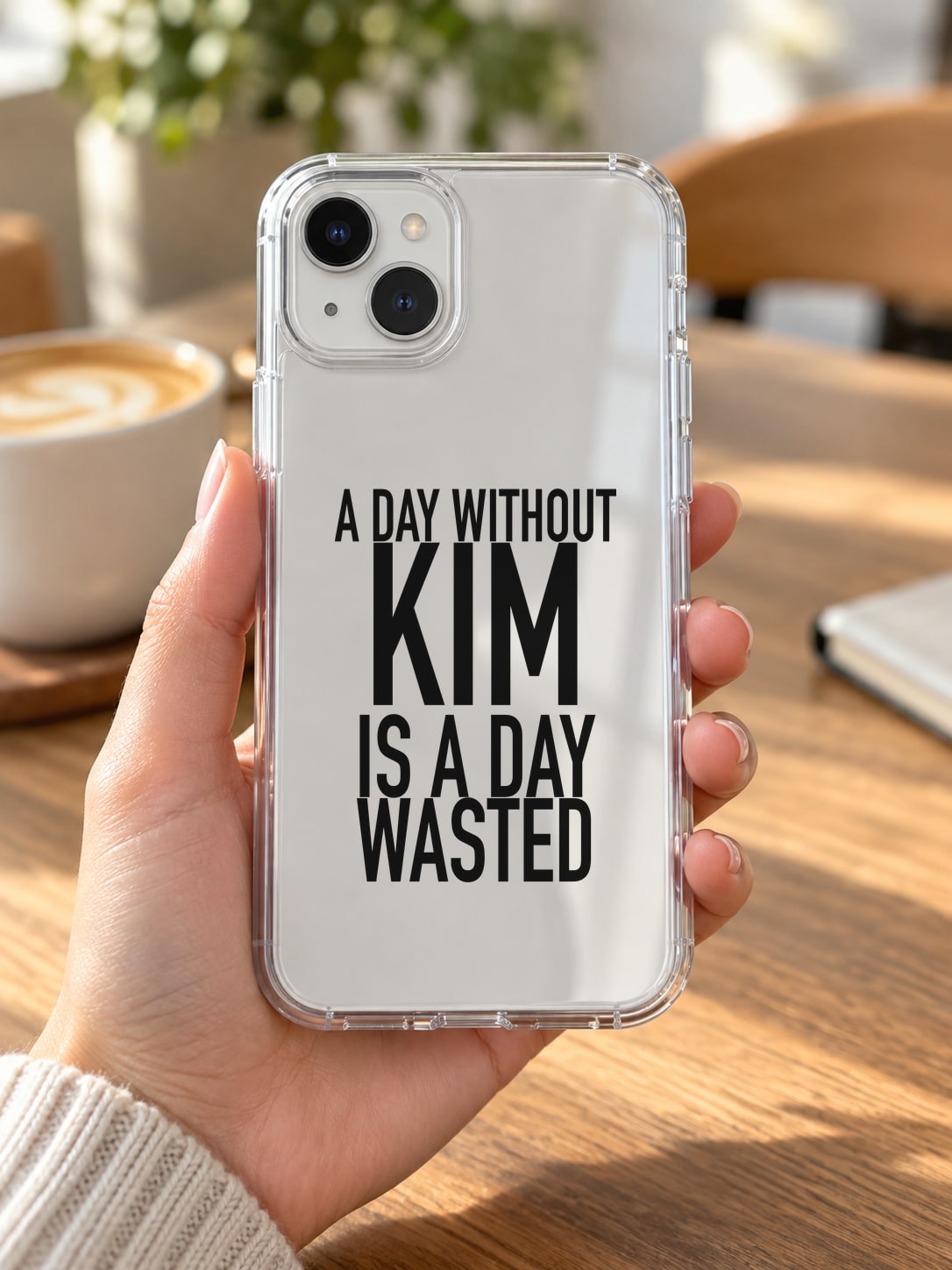 A DAY WITHOUT KIM IS A DAY WASTED phone-case handheld mockup