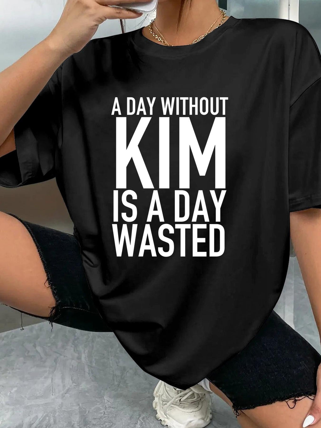 A DAY WITHOUT KIM IS A DAY WASTED women-tshirt black original model 02