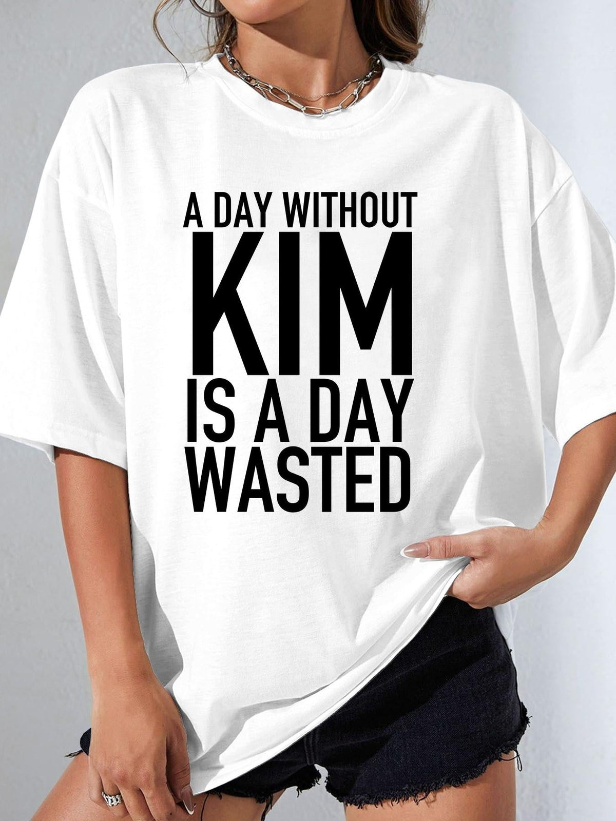 A DAY WITHOUT KIM IS A DAY WASTED women-tshirt white original model 01