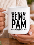 IT'S A TOUGH JOB BEING PAM BUT SOMEONE HAS TO DO IT mug handheld-white mockup