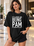 IT'S A TOUGH JOB BEING PAM BUT SOMEONE HAS TO DO IT women-tshirt lifestyle-black mockup