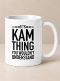 White 11oz mug with It's Kam thing you wouldn't understand quote print on warm greige background