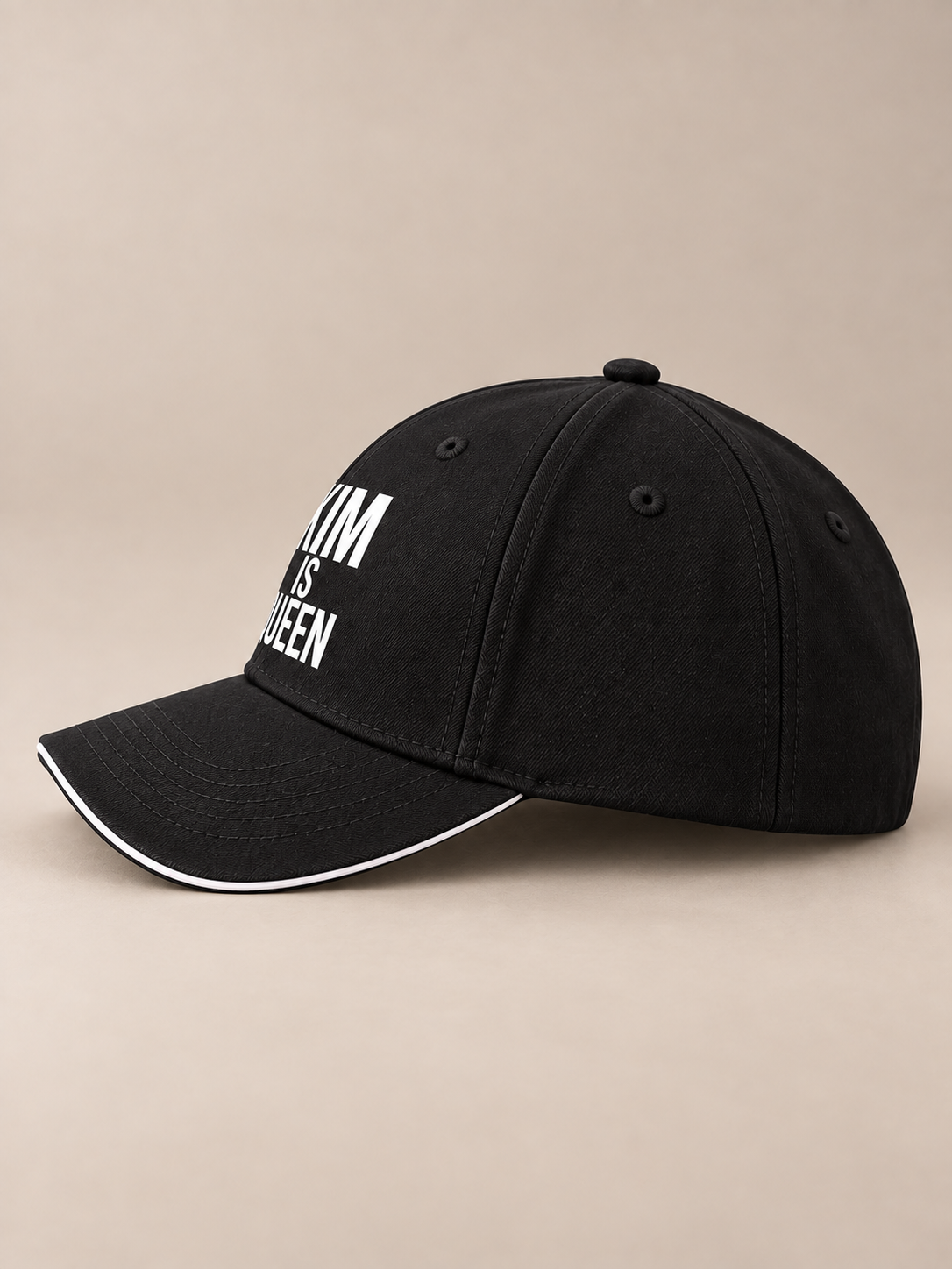 Side view of KIM IS QUEEN black sandwich baseball cap