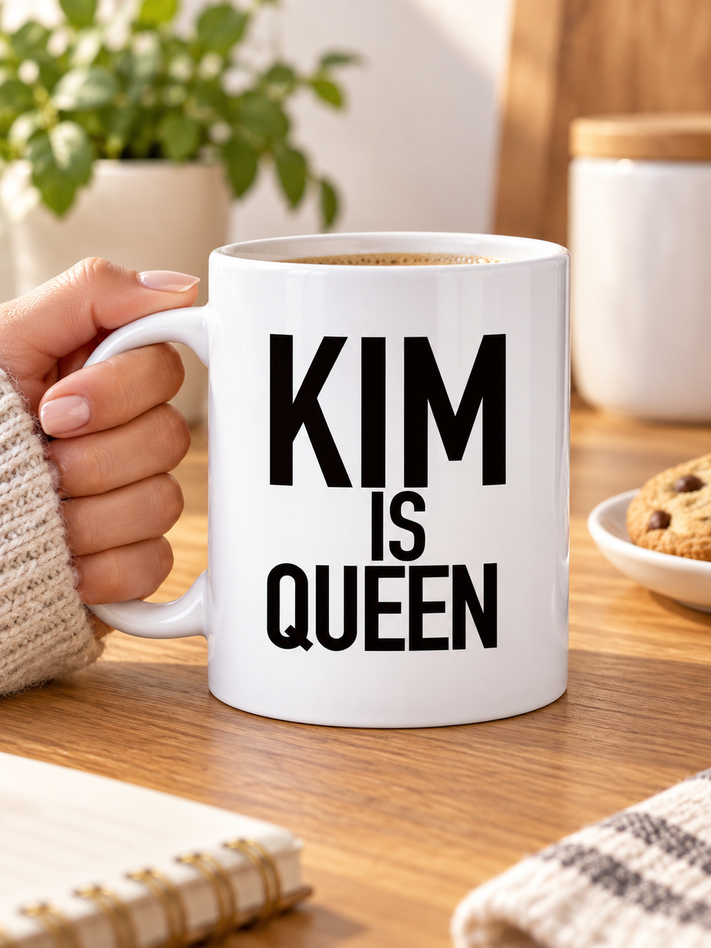 KIM IS QUEEN 11oz mug handheld lifestyle image