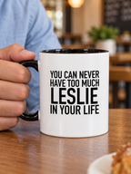 YOU CAN NEVER HAVE TOO MUCH LESLIE IN YOUR LIFE mug handheld-black-white mockup
